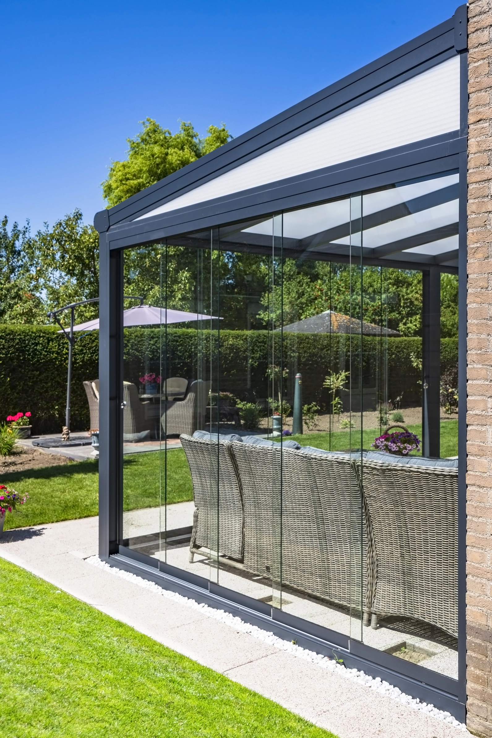 Szklane drzwi przesuwne do pergoli